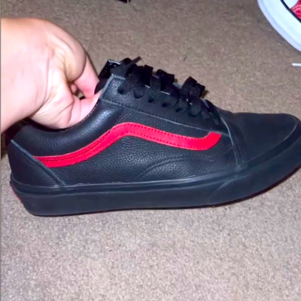 All black with red black line LEATHER low top vans!